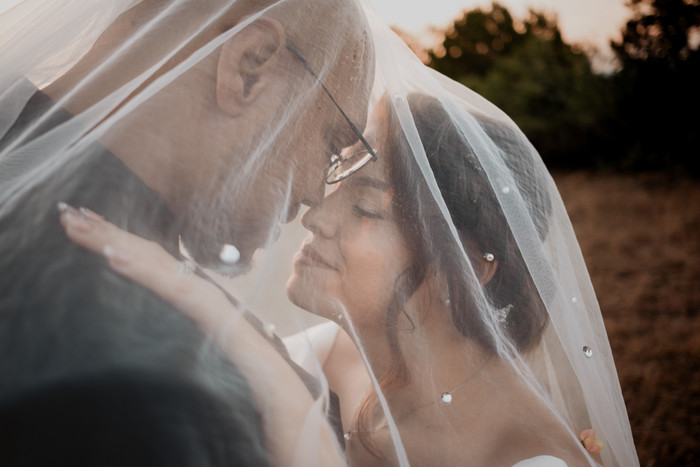 Kim & Stuart’s wedding at Harper Hill Ranch Wedding + Events, Seguin, TX, photographed by Weddings Unlimited